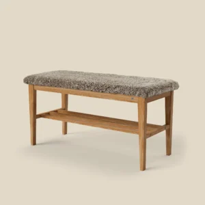 Nadja bench 90 in oiled oak with sahara sheepskin on beige background
