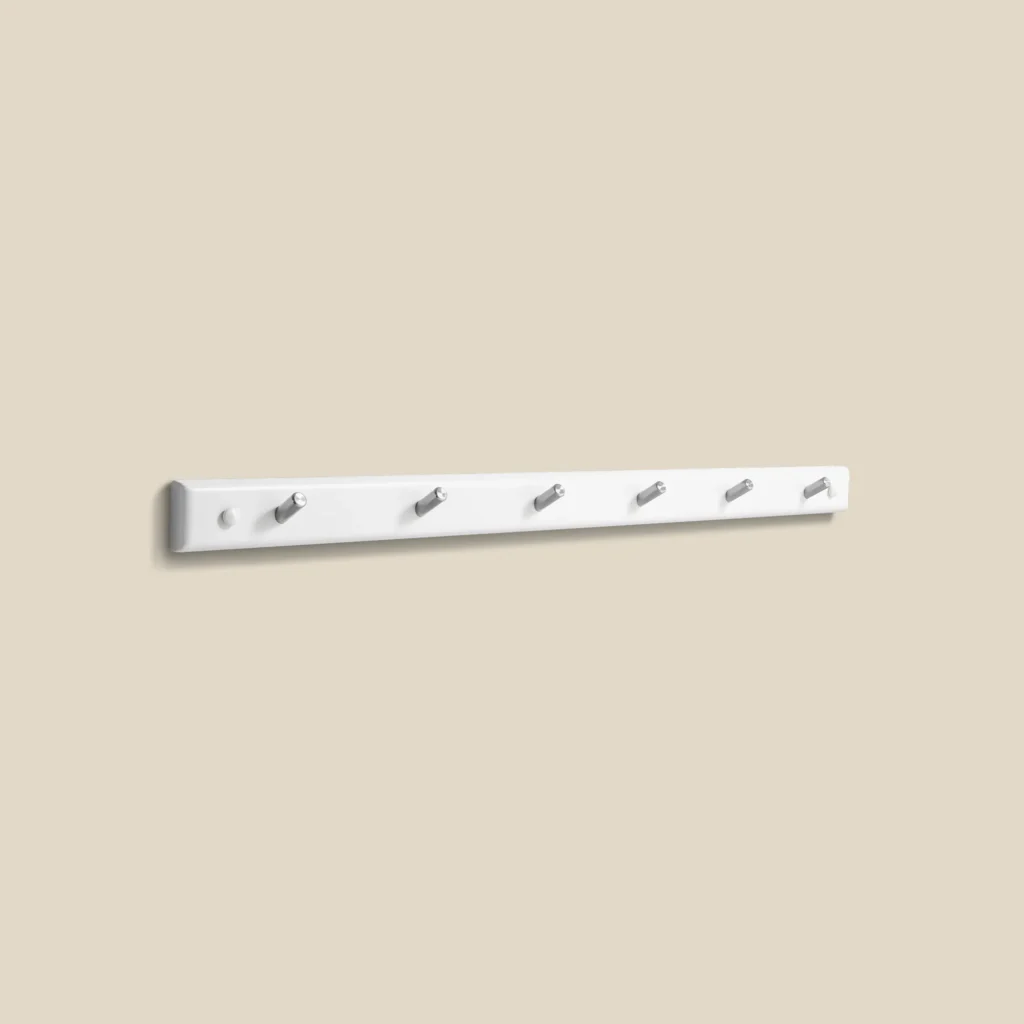 Meja hook rail in white lacquer with polished steel L80 on beige background